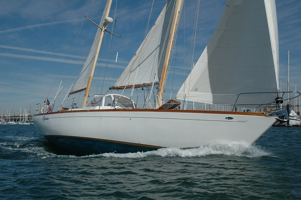 Cheoy Lee 44 ketch sailboat with sails up heeling