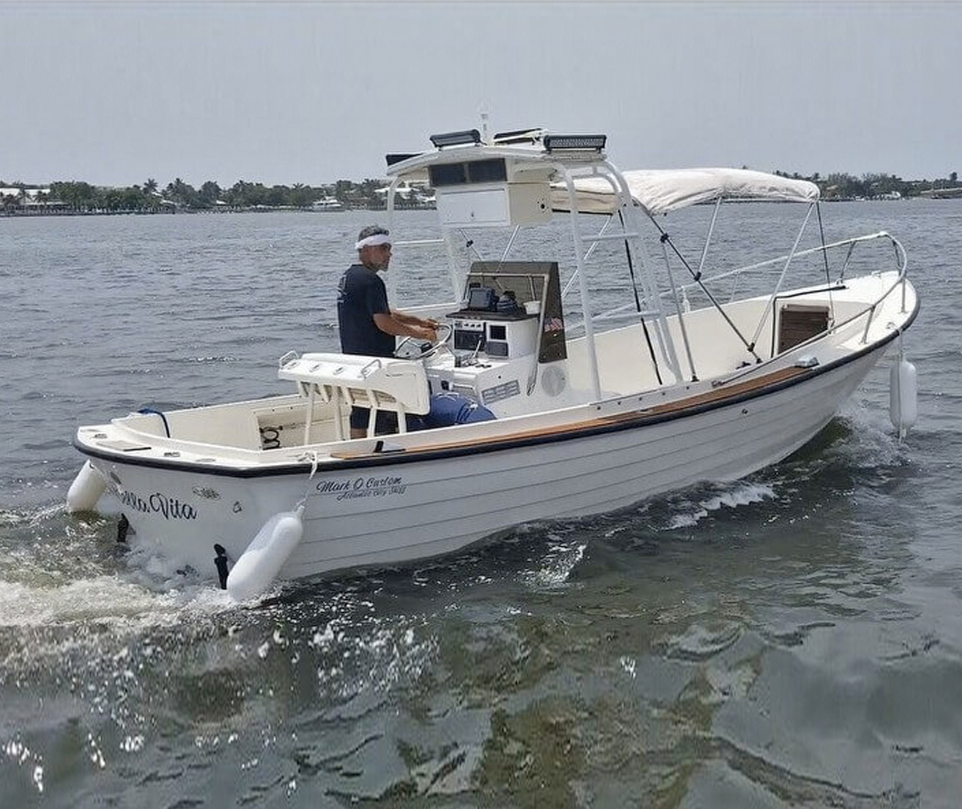 yacht with dinghy boat