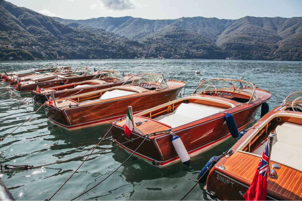 A row of classic boats in Lake Como