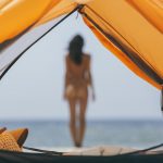 Naked-Woman-on-the-Beach-with-a-Tent.