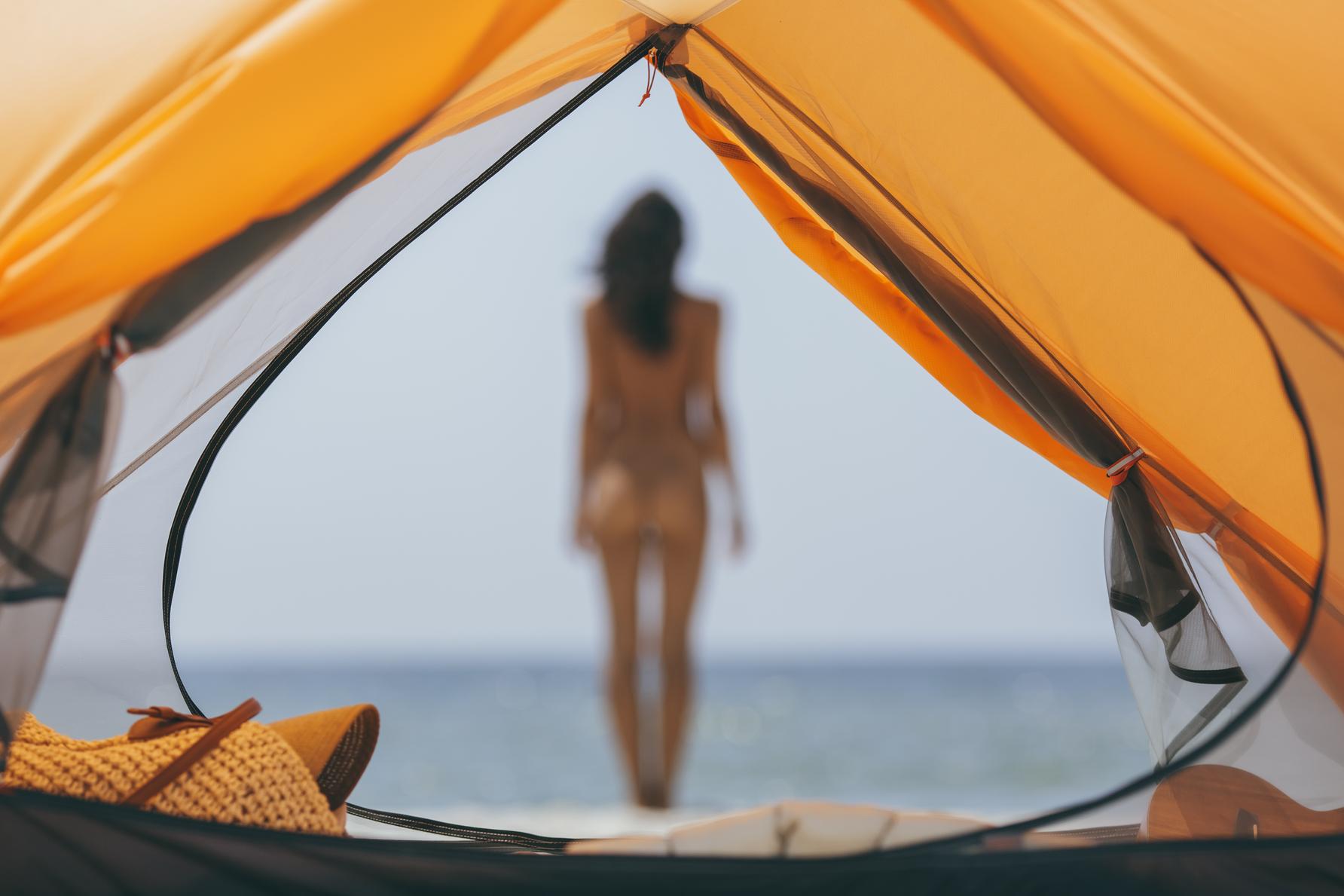 Naked-Woman-on-the-Beach-with-a-Tent.
